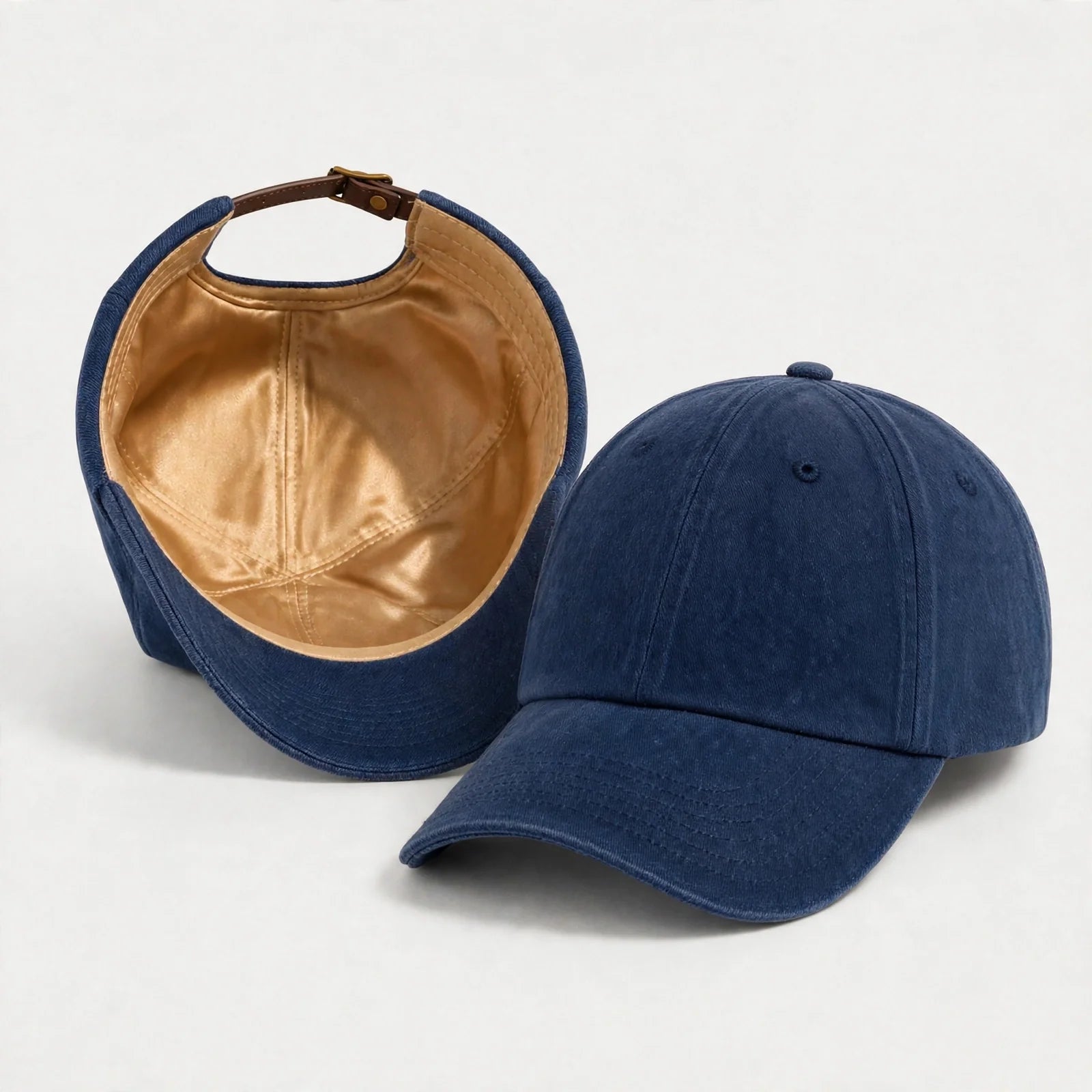 The Silk-Lined Cotton Twill Hat in Antique Navy, exterior and silk-lined interior