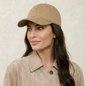 The Silk-Lined Cotton Twill Hat in Khaki, worn by a model