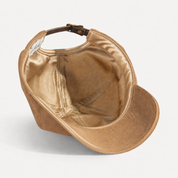 The Silk-Lined Hat in Camel, champagne-gold silk interior and silk sweatband