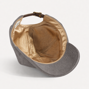 The Silk-Lined Hat in Charcoal, champagne-gold silk interior and silk sweatband