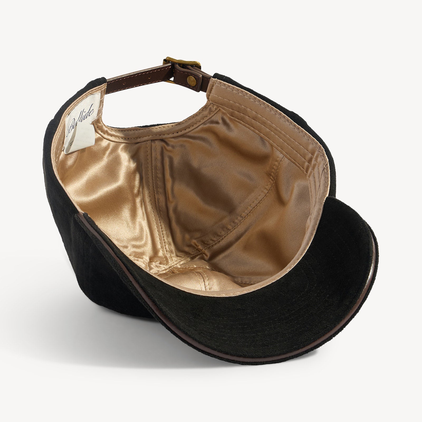 The BOLLIDE Silk-Lined Hat in Noir turned over to show its silk lining and sweatband